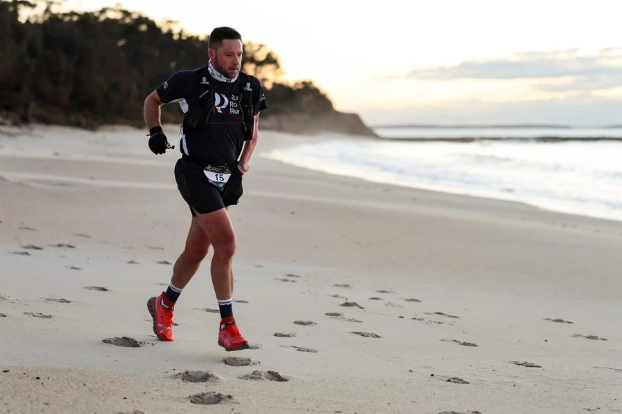 Rodney running along the beach at Jervis Bay